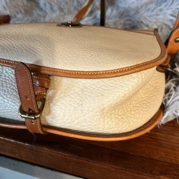 Vintage Dooney & bourke bundle. Saddle bag in bone and kiss lock wallet.